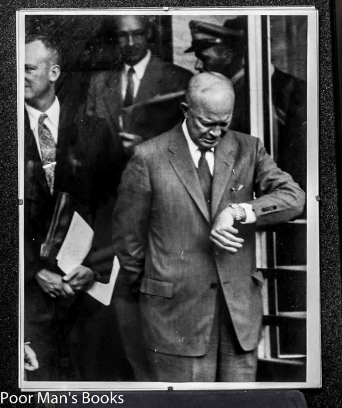 Image for 11 X 14" B/W FRAMED PHOTO OF PRESIDENT DWIGHT D EISENHOWER GLARING AT HIS WATCH. [LBC}